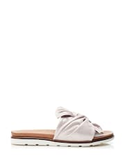 Jemini Twist Bow Flat White Leather Sandals - Image 1 of 4