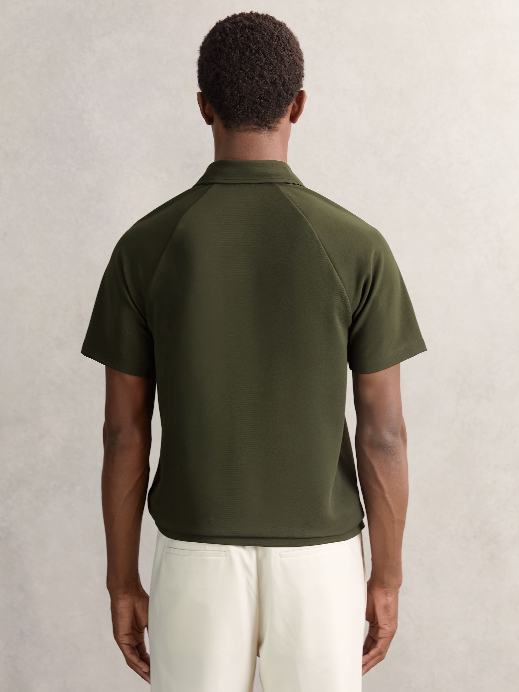 Buy Reiss Green Winston Textured Raglan Half-Zip Polo Shirt from