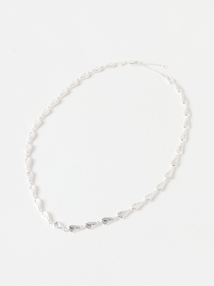 Oliver Bonas Silver Tone Talia Molten Shell Plated Chain Necklace - Image 1 of 1 Oliver Bonas Silver Tone Talia Molten Shell Plated Chain Necklace - Image 1 of 1