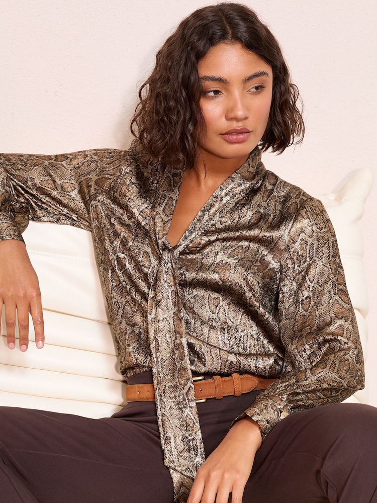 Friends Like These Metallic Snake Print Long Sleeve Tie Neck Blouse - Image 1 of 5