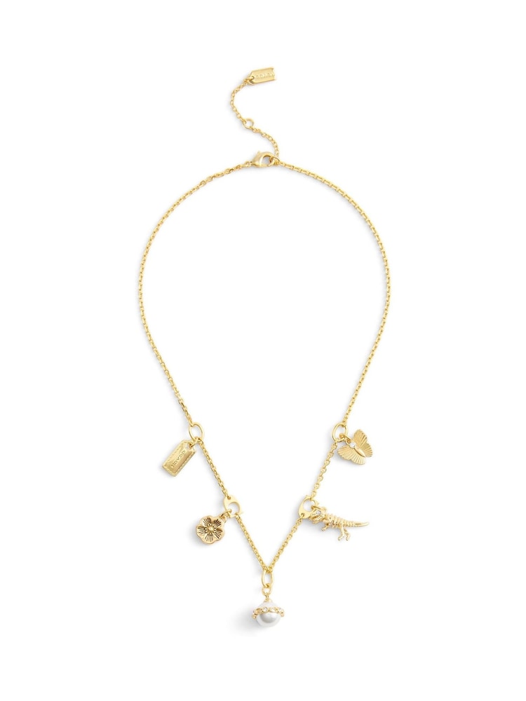 COACH Gold Tone Signature Heritage Pearl Mixed Charm Bib Necklace - Image 1 of 4 COACH Gold Tone Signature Heritage Pearl Mixed Charm Bib Necklace - Image 1 of 4