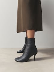 Black Leather Signature Curved Toe Sock Boots - Image 1 of 12