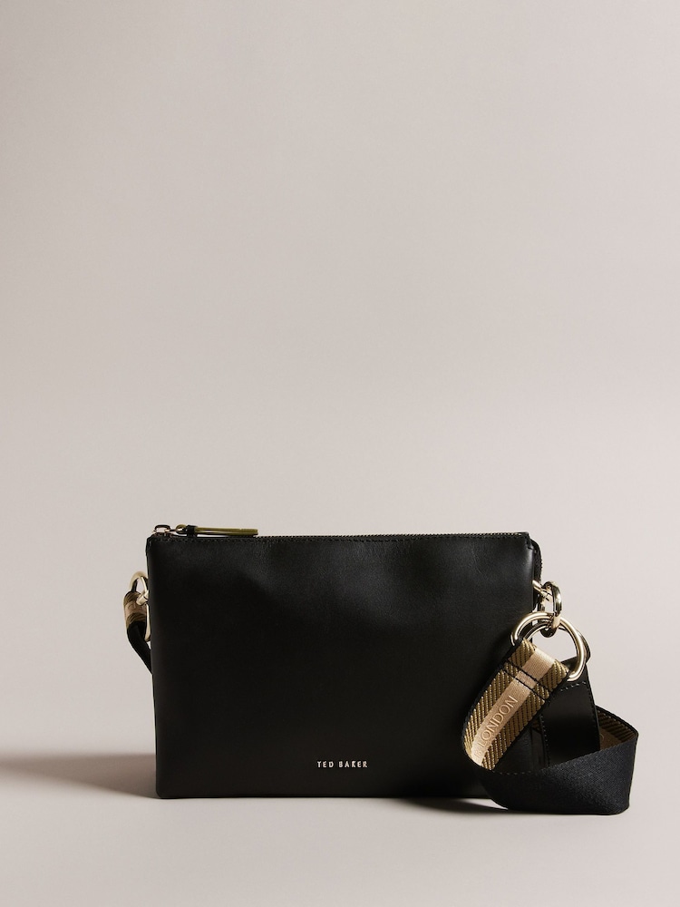 حقيبة جلد تُعلَّق حول الجسم Darceyy بحزام مُزيّن بعلامة تجارية من Ted Baker - صورة 1 من 6 حقيبة جلد تُعلَّق حول الجسم Darceyy بحزام مُزيّن بعلامة تجارية من Ted Baker - صورة 1 من 6