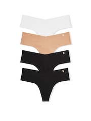 Victoria's Secret Black/Nude/White Thong 4 Pack Knickers - Image 1 of 8
