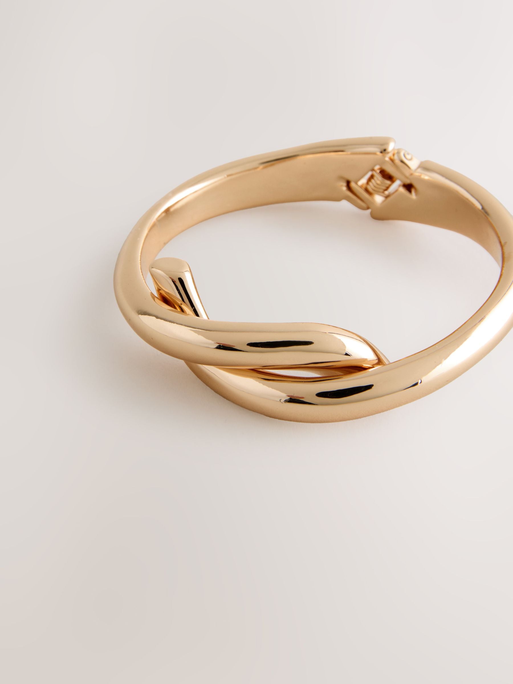 Buy Gold Tone Cross-Over Hinge Bangle from Next Romania