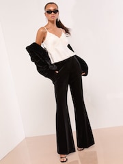 Lipsy Black Velvet Petite Flared Leg Tailored Trousers - Image 1 of 5