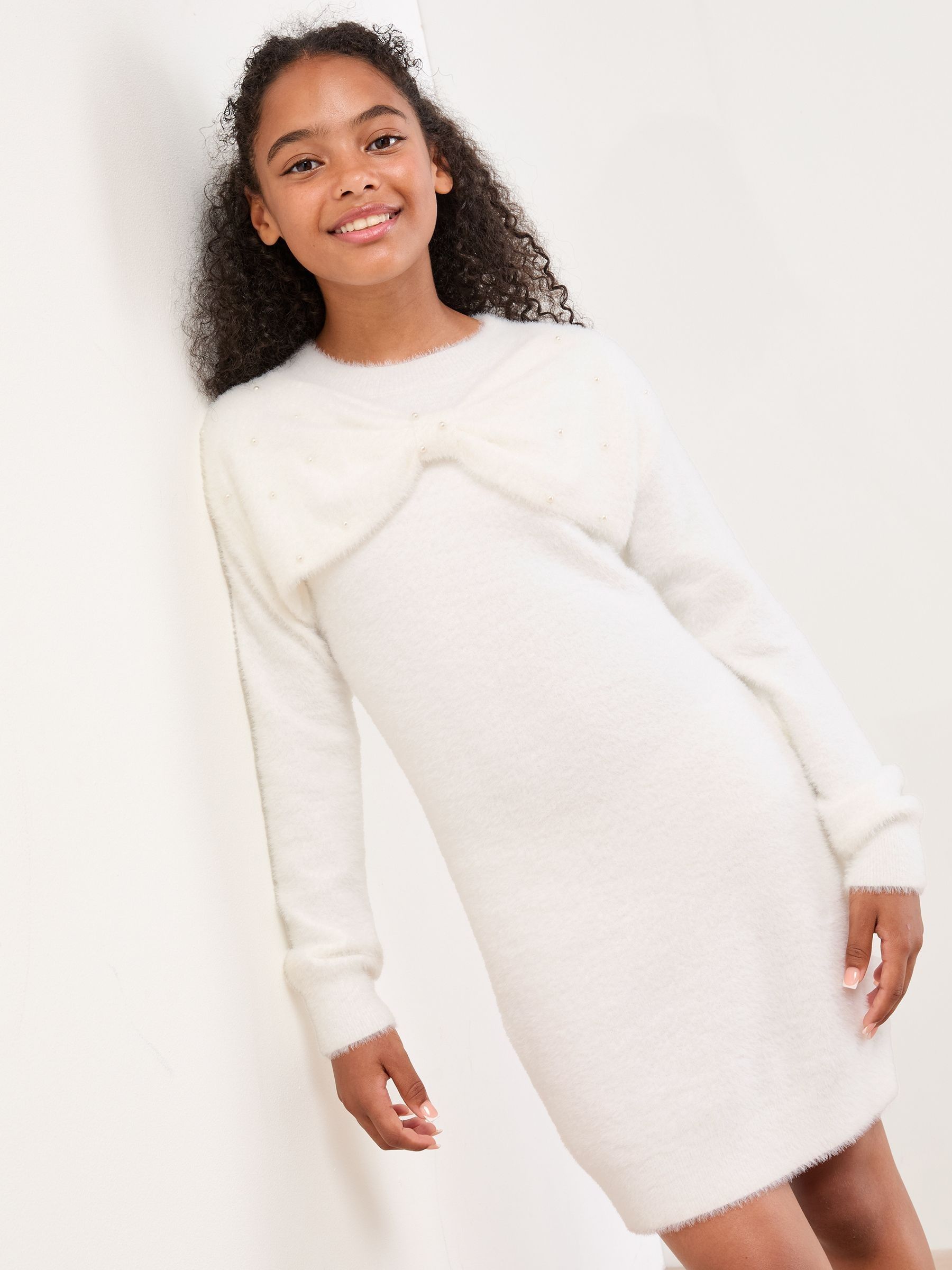 Buy Lipsy Cream White Bow Knit Dress (5-16yrs) from the Next UK