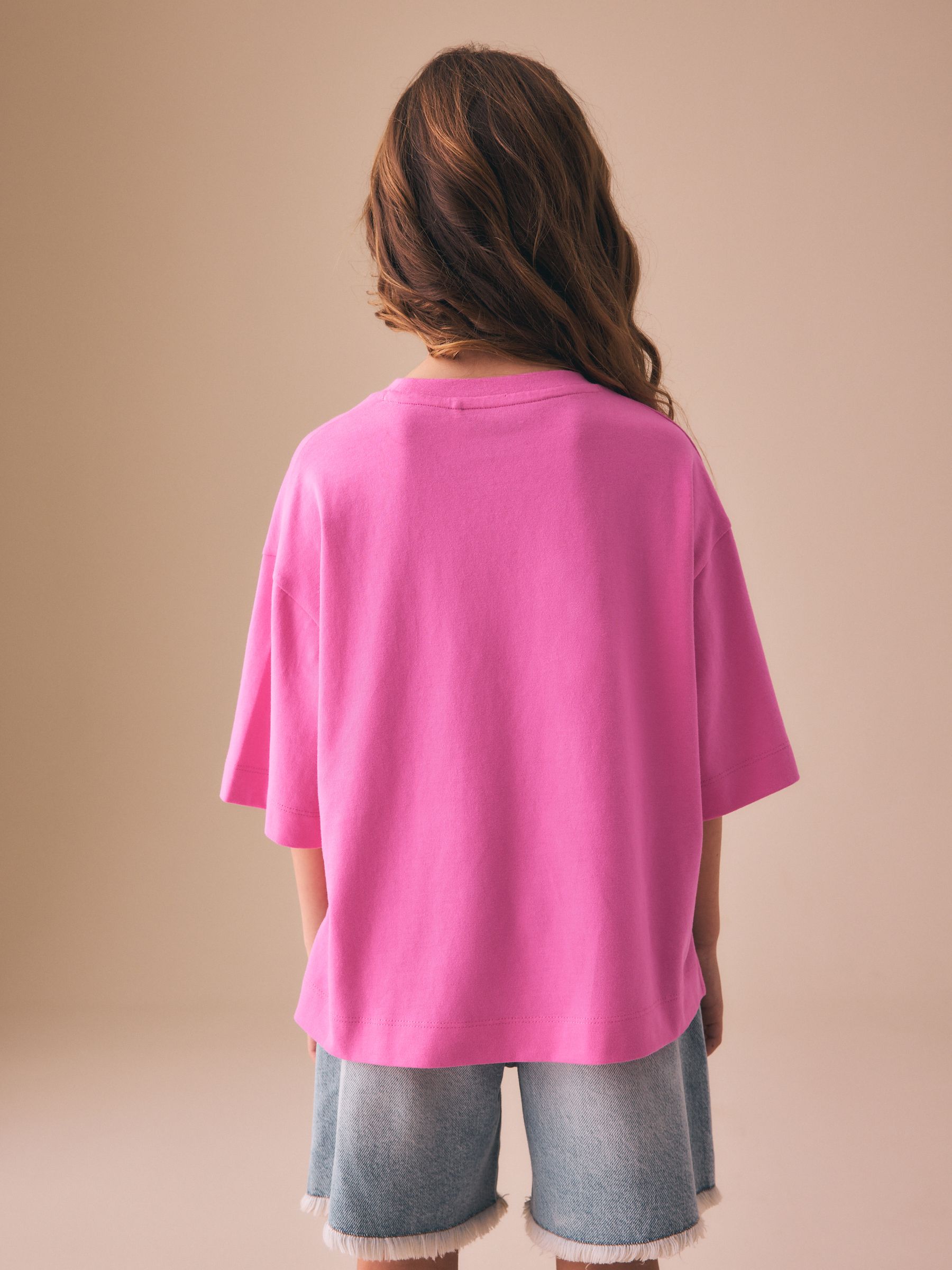 Buy Pink Garden Oversized Graphic Print T-Shirt (3-16yrs) from the