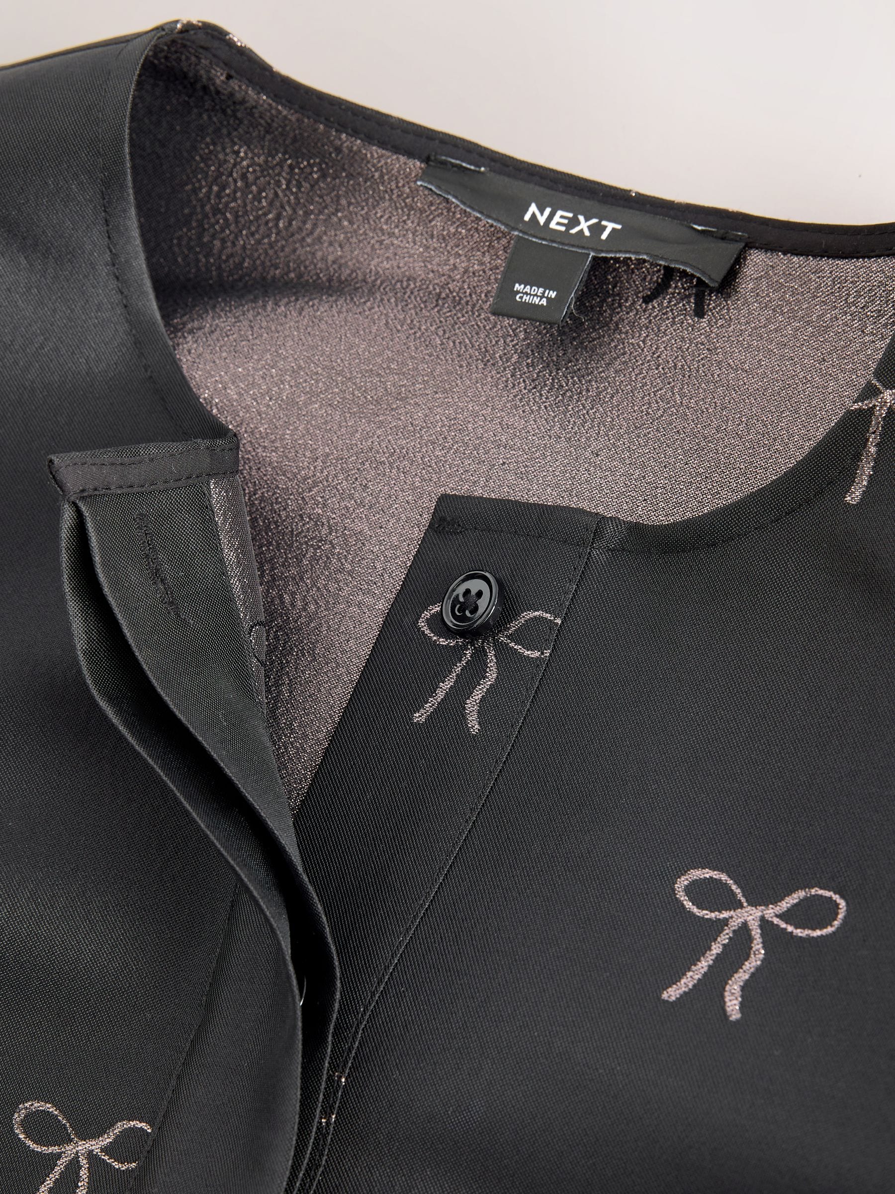 Buy Black Jacquard Bow Puff Sleeve Blouse from the Next UK online shop