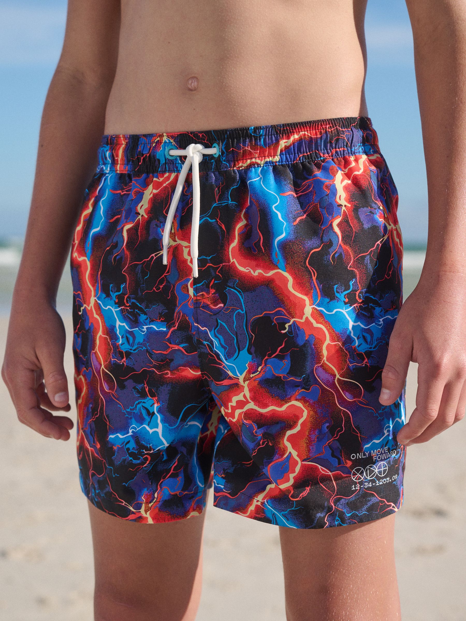 Buy Black Lightening Bolt Printed Swim Shorts (3-16yrs) from Next USA