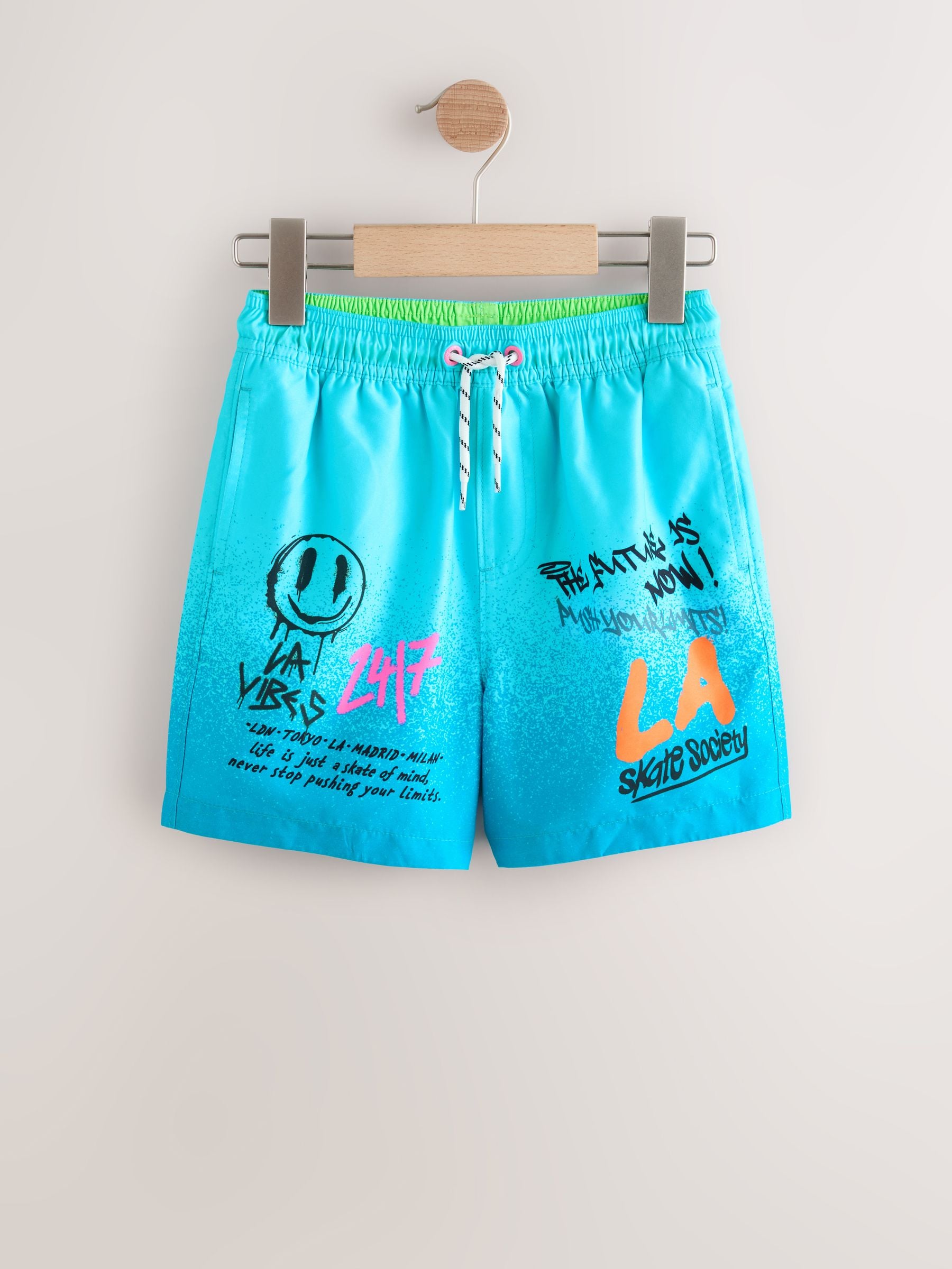 Buy Blue Graffiti Printed Swim Shorts (3mths-16yrs) from Next USA