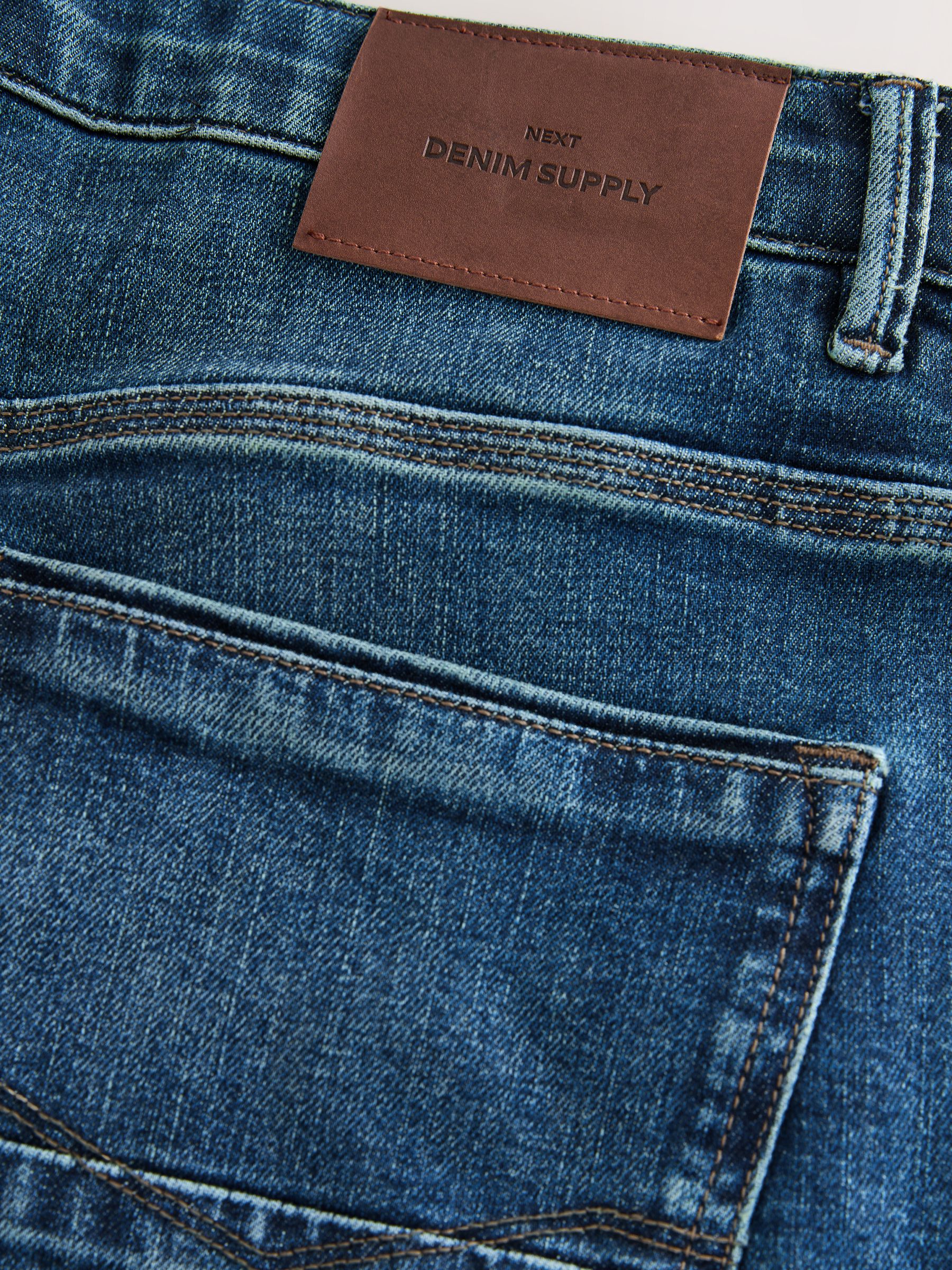 Buy Mid Blue Relaxed Fit Authentic Stretch Denim Jeans from Next USA