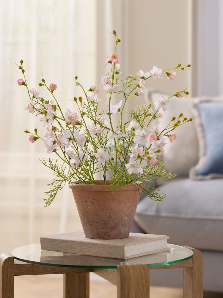 Pink/White Artificial Flowering Plant in Terrecota pot - Image 1 of 4 Pink/White Artificial Flowering Plant in Terrecota pot - Image 1 of 4