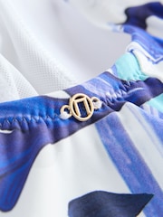 Blau/Weiß mit Blumendruck - Wickel-Badeanzug mit Bauchkontrolle - Bild 7 von 8