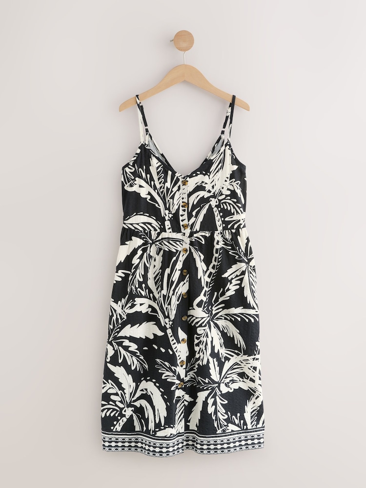 Schwarz/Weiß mit Palmenprint - Jersey-Midikleid mit Knopfleiste - Bild 1 von 3