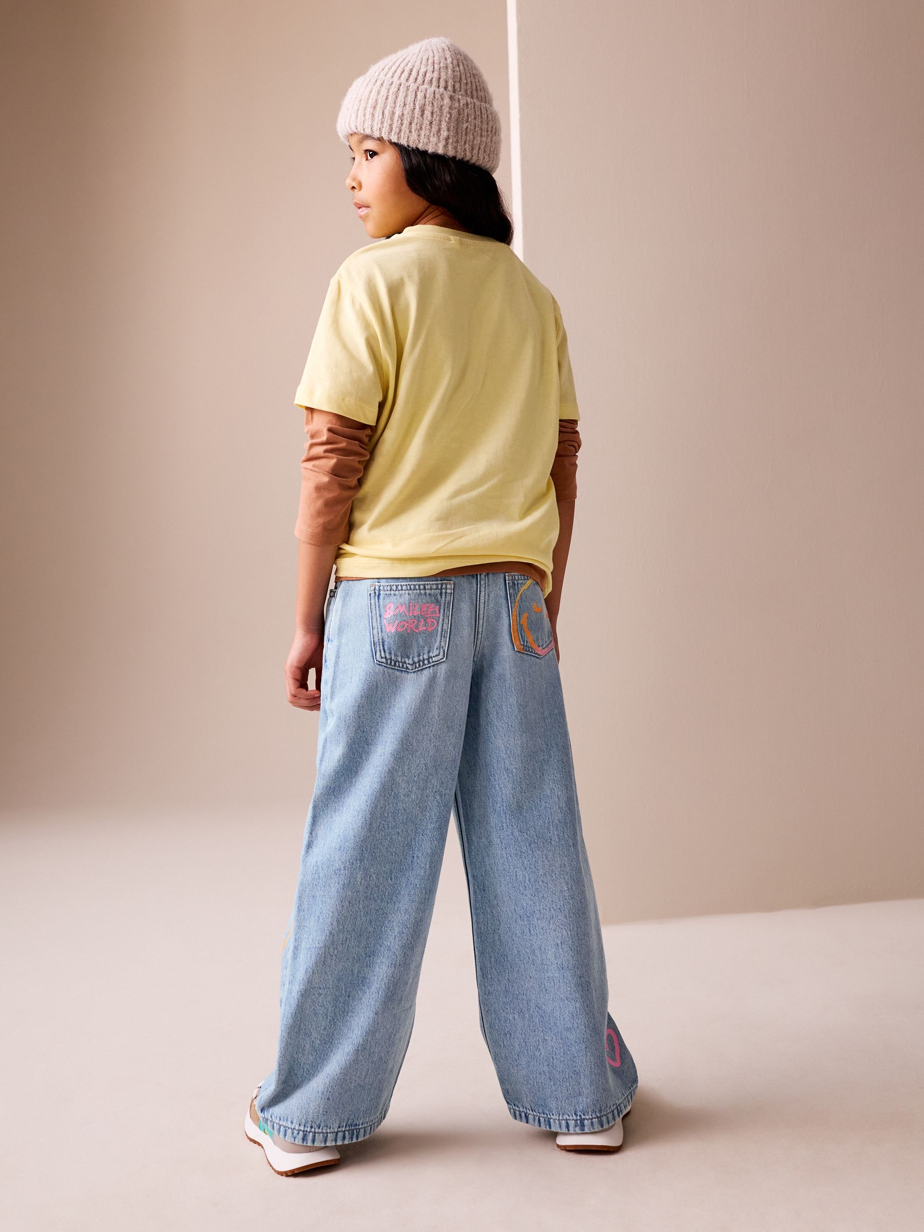 Buy Mid Blue SmileyWorld® Print Wide Leg Jeans (3-16yrs) from Next