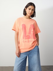 Fluro Orange Oversized Washed Bright LA City Graphic Print Short Sleeve Crew Neck T-Shirt - Image 1 of 6