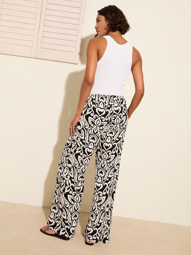 Friends Like These Black Floral Crinkle Jersey Wide Leg Trousers - Image 4 of 4 Friends Like These Black Floral Crinkle Jersey Wide Leg Trousers - Image 4 of 4