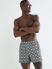 River Island Black Multi Colour Geo Print Swim Shorts - Image 1 of 4