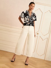 Love & Roses Animal Black/White Sequin V-Neck Blouse - Image 3 of 4