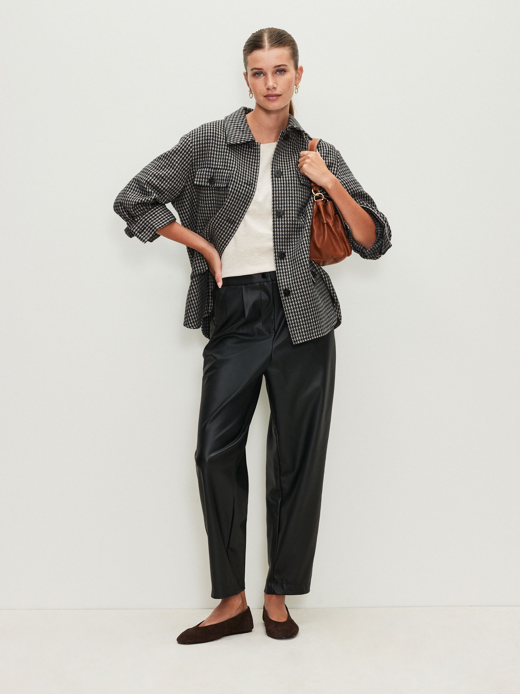 Buy Black Faux Leather Barrel Leg Trousers from the Next UK online