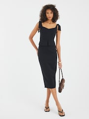 Vestido midi com espartilho e laço River Island - Imagem 1 de 4