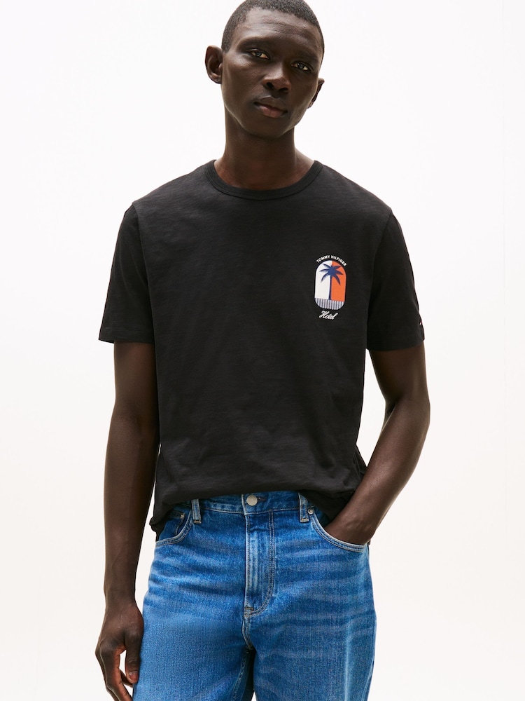 Tommy Hilfiger Black Tropical Logo Crew Neck T-Shirt - Image 1 of 5 Tommy Hilfiger Black Tropical Logo Crew Neck T-Shirt - Image 1 of 5