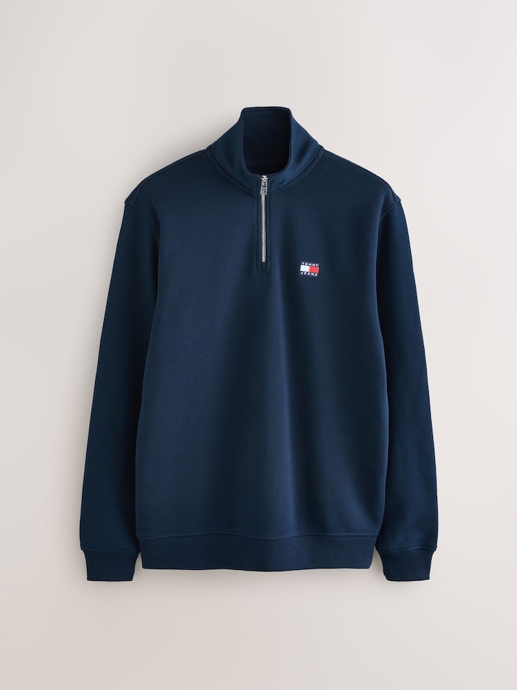 Tommy Jeans Blue Regular Fit Quarter Zip Badge Jumper - Image 1 of 1 Tommy Jeans Blue Regular Fit Quarter Zip Badge Jumper - Image 1 of 1