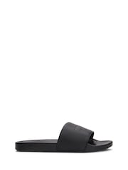 Tommy Hilfiger Black Embossed Logo Pool Slides - Image 1 of 4