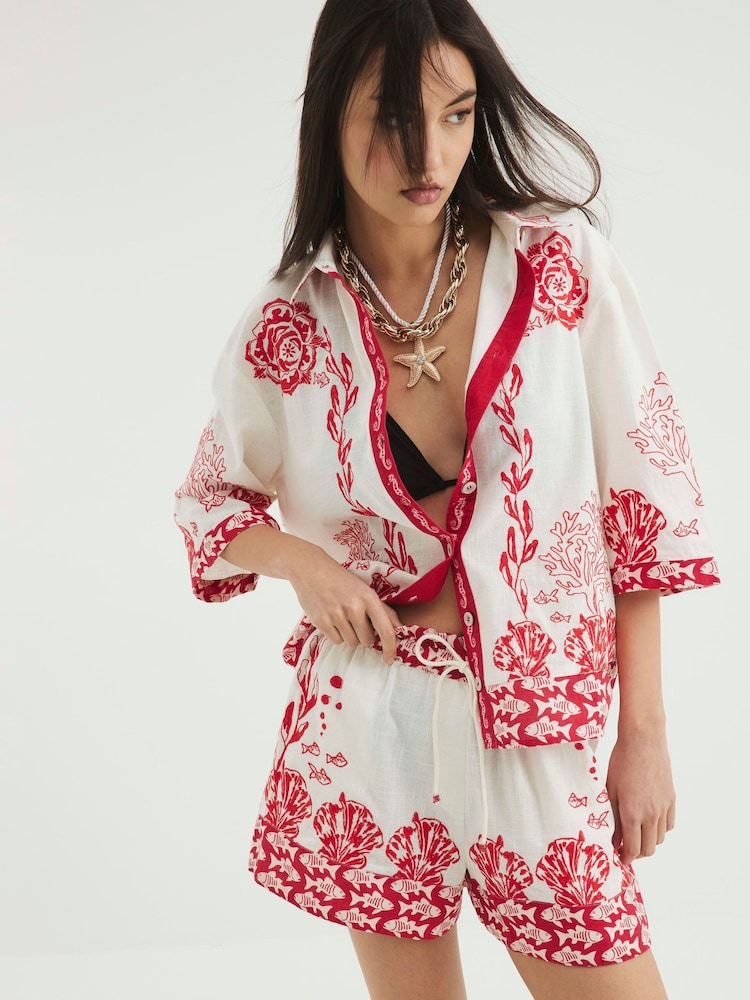 River Island Red Shell Printed Tie Waist Shorts - Image 1 of 4