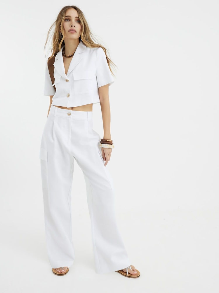 أبيض - بنطلون برِجل واسعة كتان من River Island - صورة 1 من 4 أبيض - بنطلون برِجل واسعة كتان من River Island - صورة 1 من 4