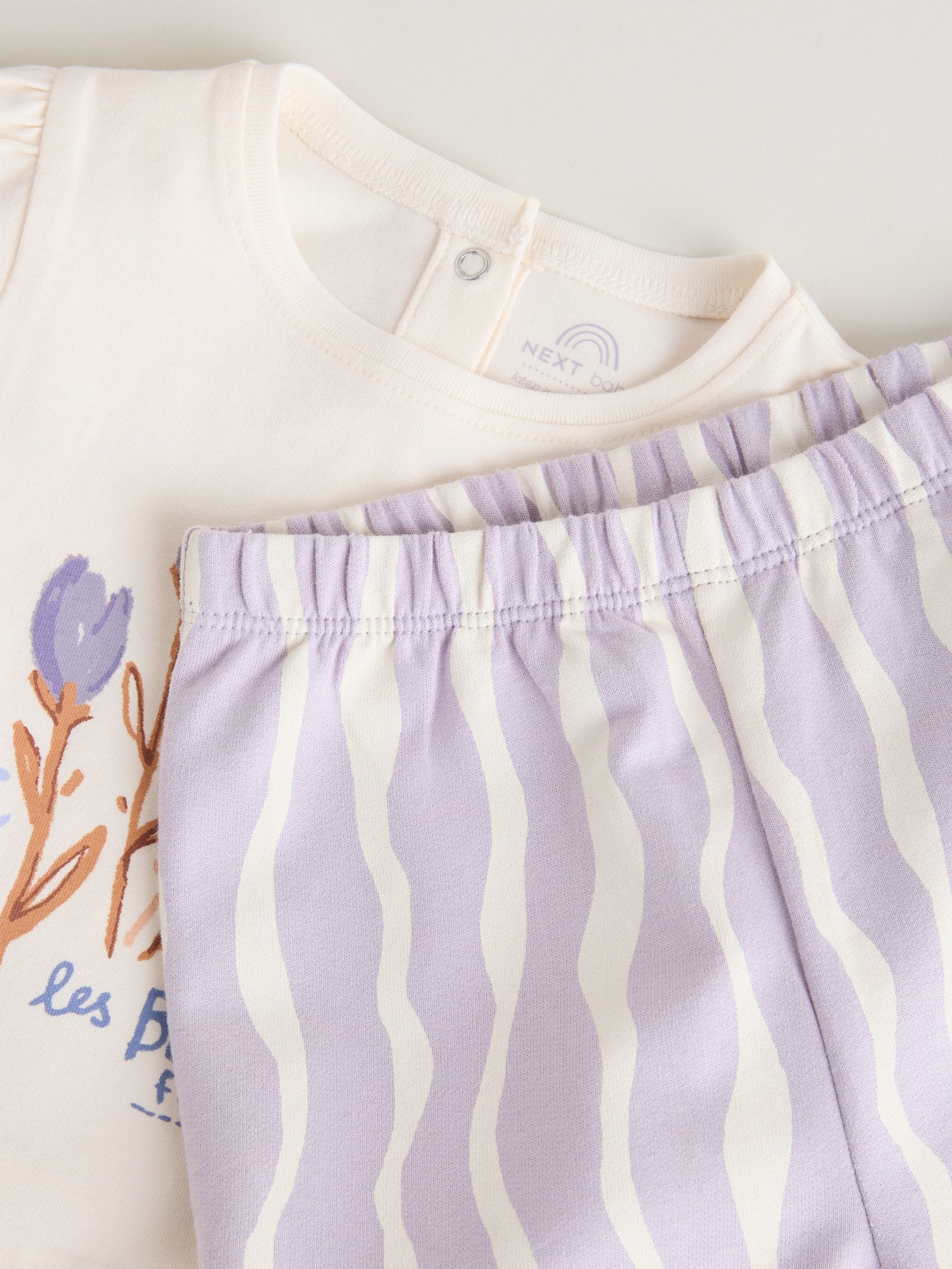 Buy Purple Flower Baby T-Shirts And Trousers 2 Piece Set (0mths