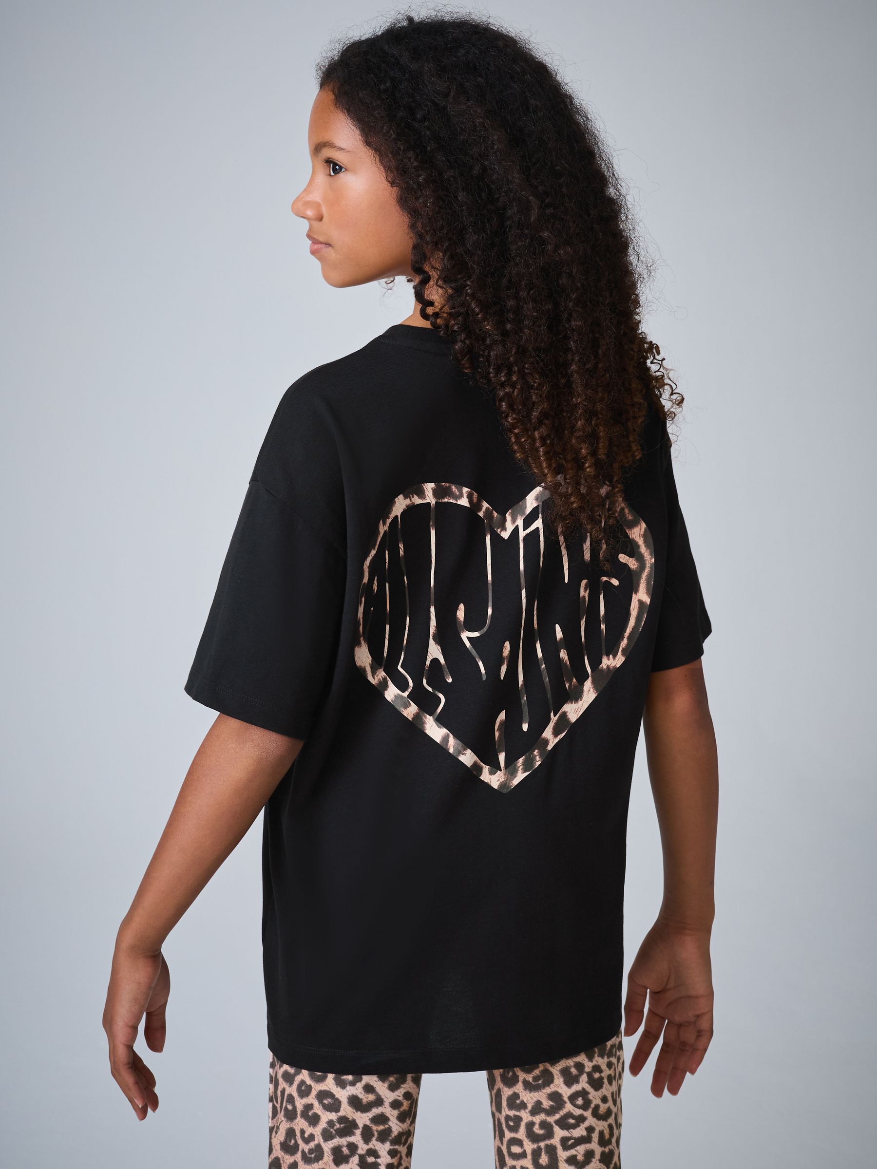 ブラック プリント入り プルオーバーＨＥＡＲＴＳ Buy smALLSAINTS Leopard Lover Oversized T-Shirt and Flared