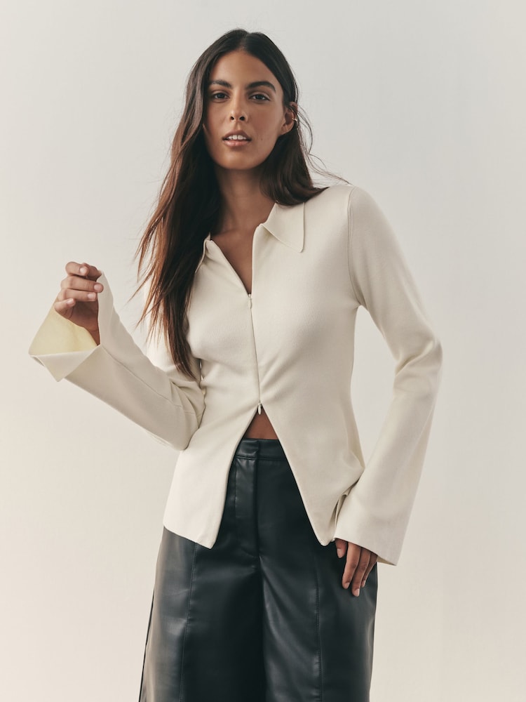 Nothing Ordinary Cream Fitted Flare Sleeve Zip Through Compact Knit Cardigan - Image 1 of 9 Nothing Ordinary Cream Fitted Flare Sleeve Zip Through Compact Knit Cardigan - Image 1 of 9