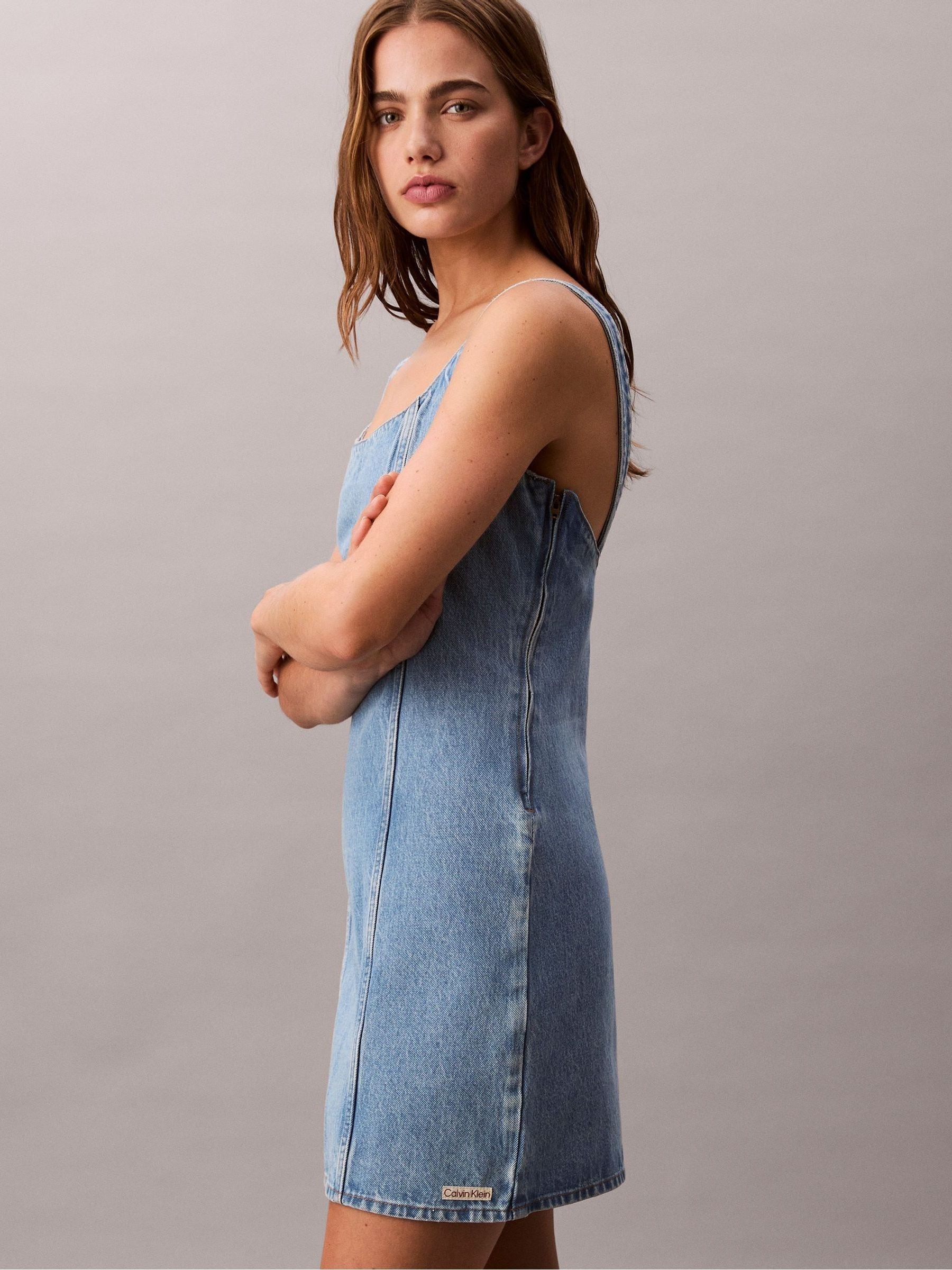 calvin klein plus size denim dress Vintage Calvin Klein Denim Dress Such a quality dress, love that it buttons all the way down. Material 100% cotton denim Size: Fits S-medium best (tagged a size M) 48 length,