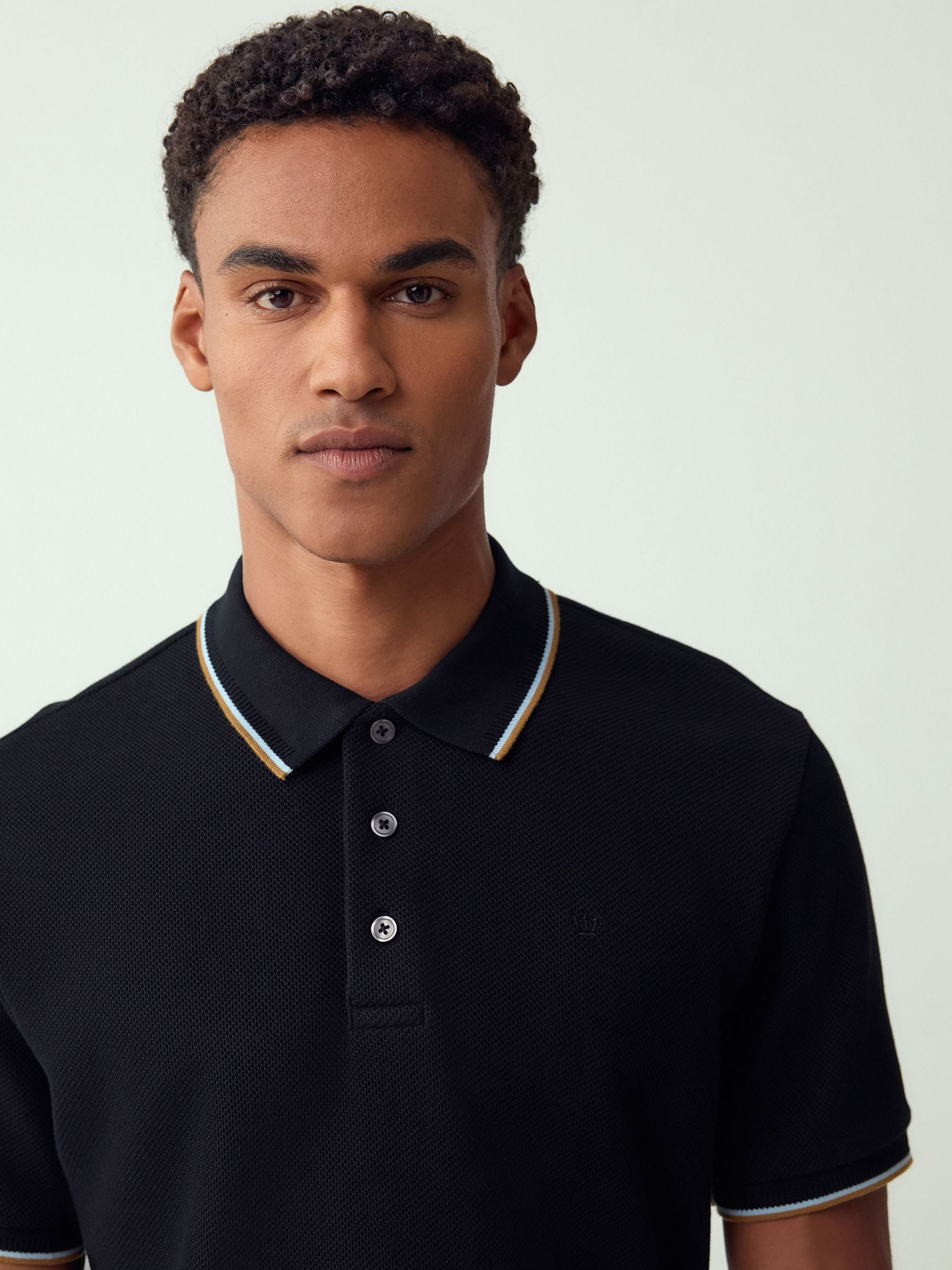Comprar Preto - Camisa polo de manga curta com detalhes nas