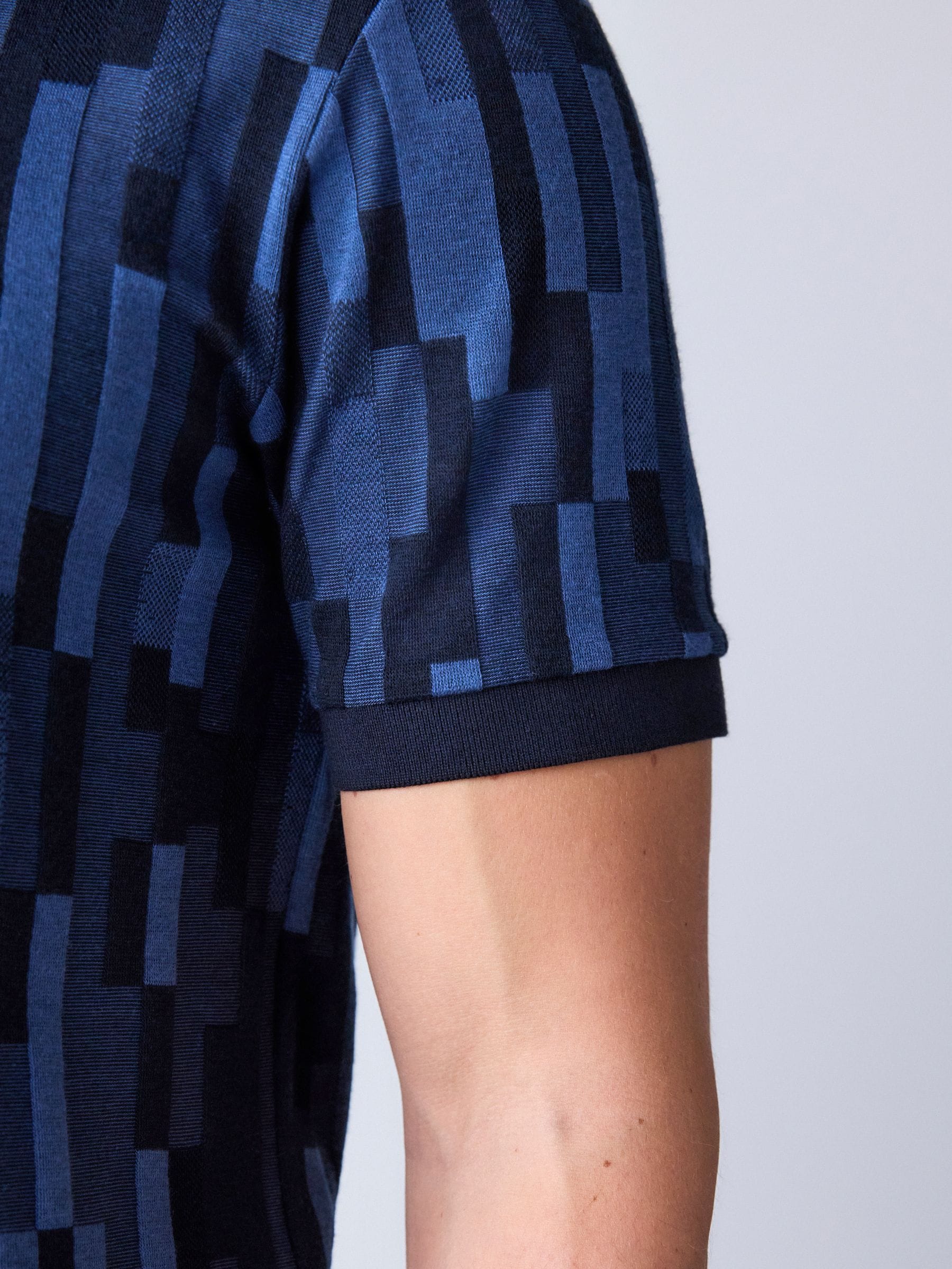 Buy Blue Block Pattern Polo Shirt from the Next UK online shop