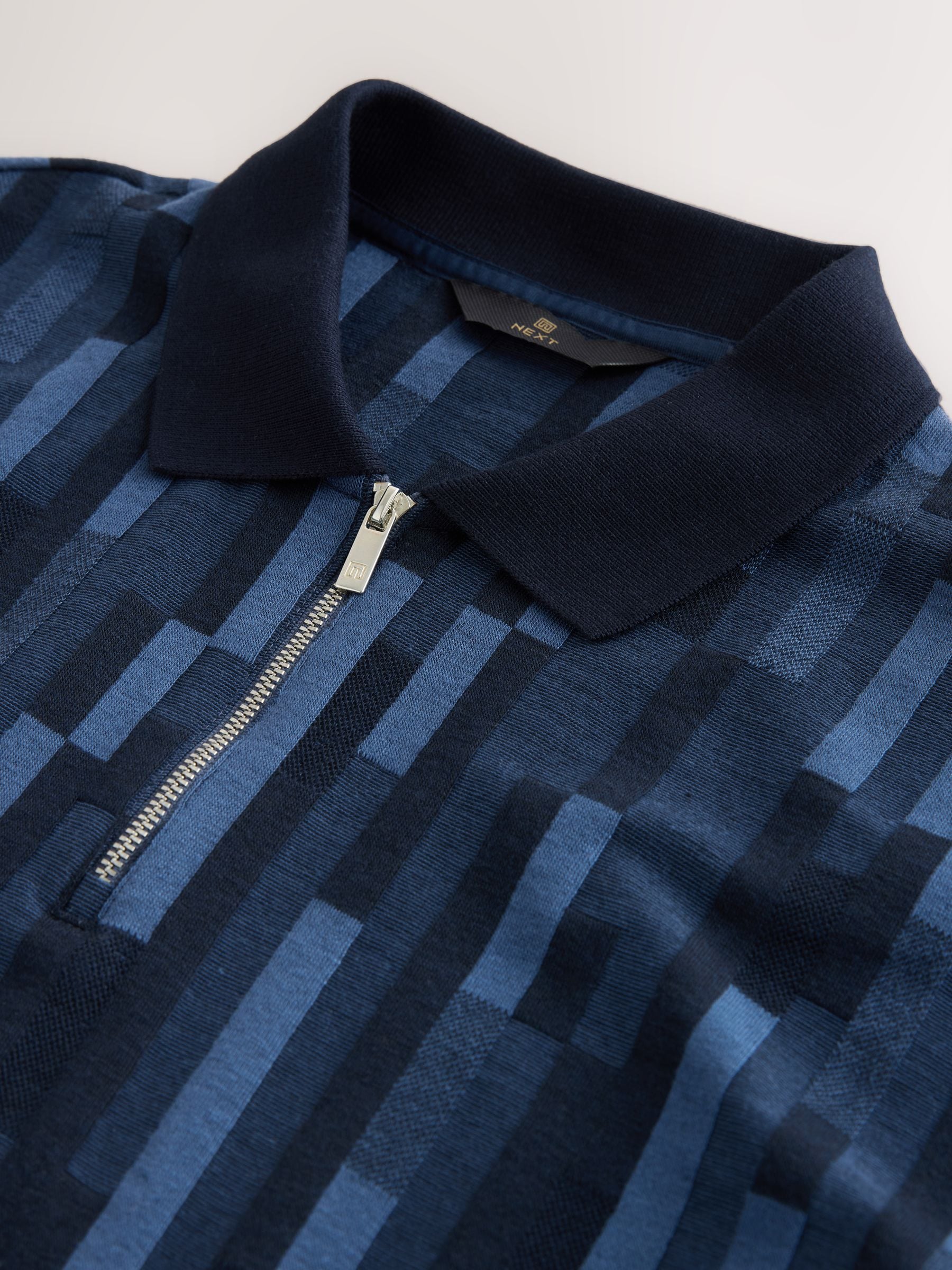 Buy Blue Block Pattern Polo Shirt from the Next UK online shop