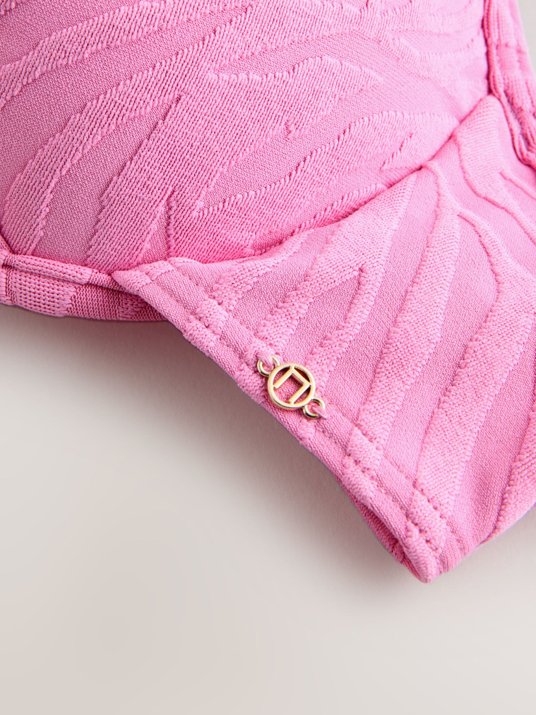 ブリ-フイング Buy Pink Zebra Textured Padded Wired Plunge Bikini Top from Next