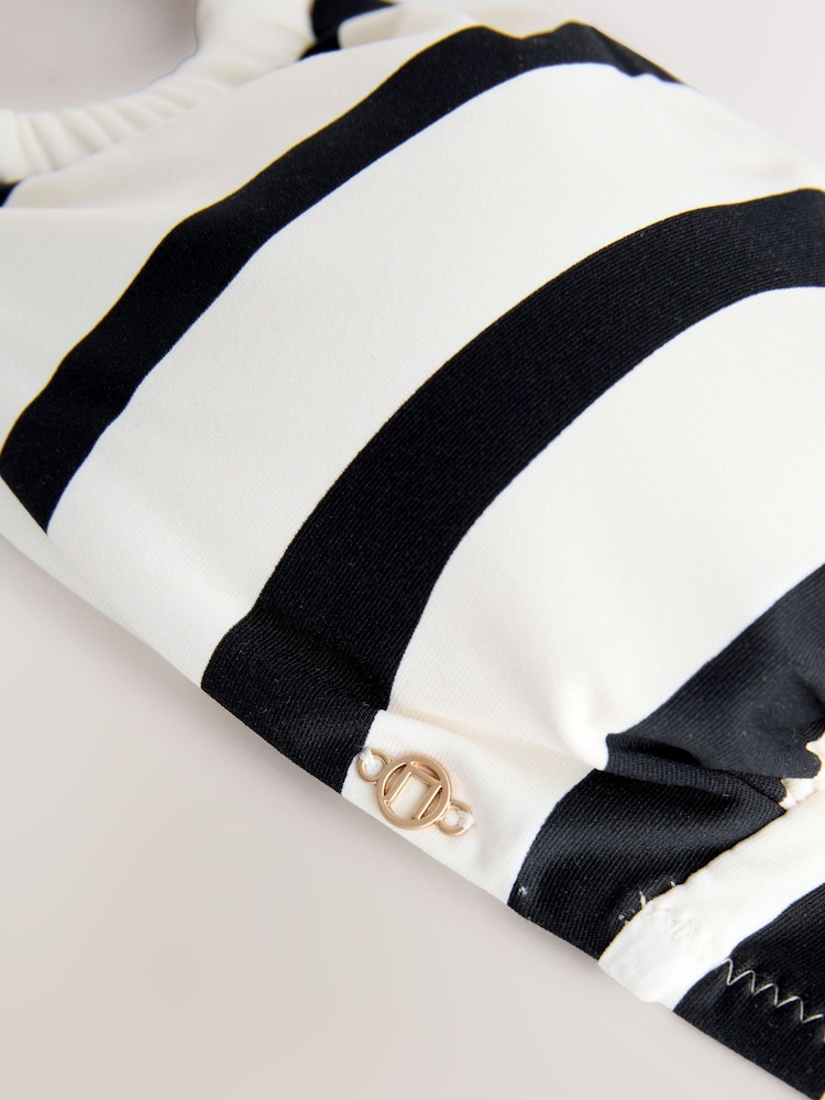 كريم/أسود مقلم - قطعة بيكيني علوية مزينة بجزء معدني وبكتف مكشوف - صورة 10 من 10 كريم/أسود مقلم - قطعة بيكيني علوية مزينة بجزء معدني وبكتف مكشوف - صورة 10 من 10