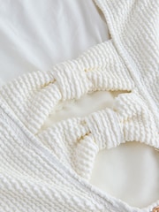 кремовый жатый - Моделирный купальник с глубоким вырезом и бантом на спине - Изображение 13 14