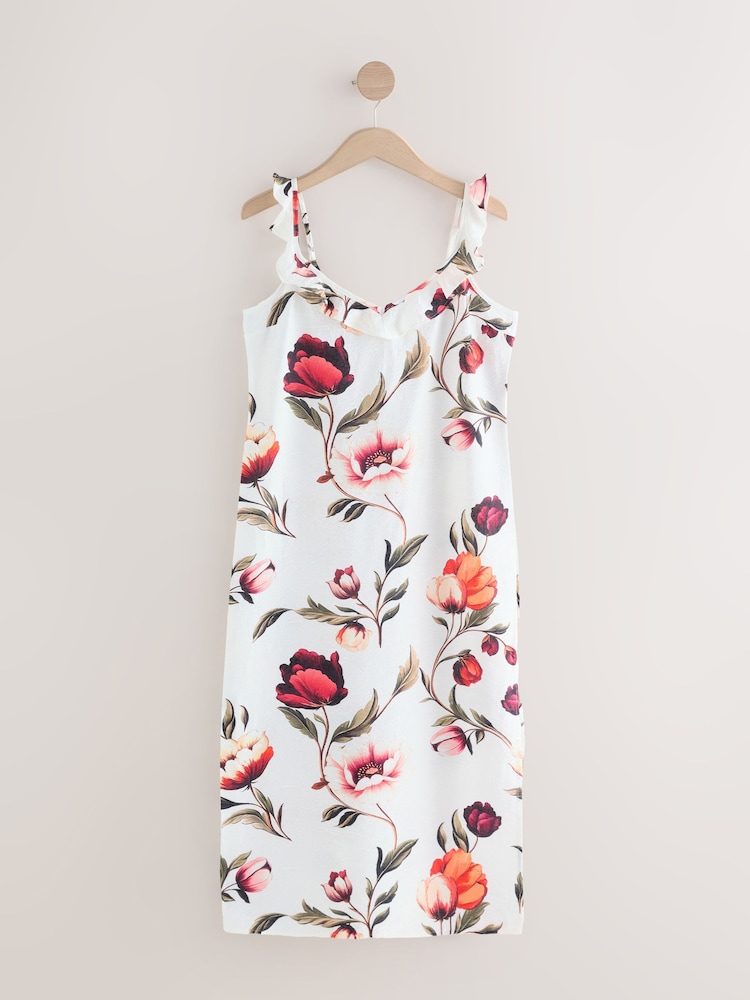 cream dress with red flowers Reformatiom Cream And Red Floral Dress by Reformation