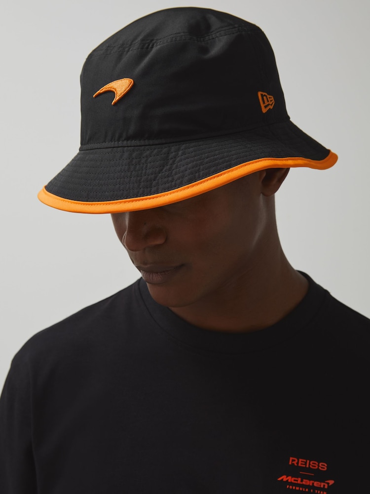 Reiss Black Fan McLaren F1 Team Speedmark Bucket Hat - Image 1 of 4 Reiss Black Fan McLaren F1 Team Speedmark Bucket Hat - Image 1 of 4
