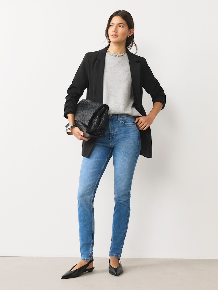 Mid Blue Denim Mid Rise Stretch Skinny Jeans - Image 1 of 8 Mid Blue Denim Mid Rise Stretch Skinny Jeans - Image 1 of 8