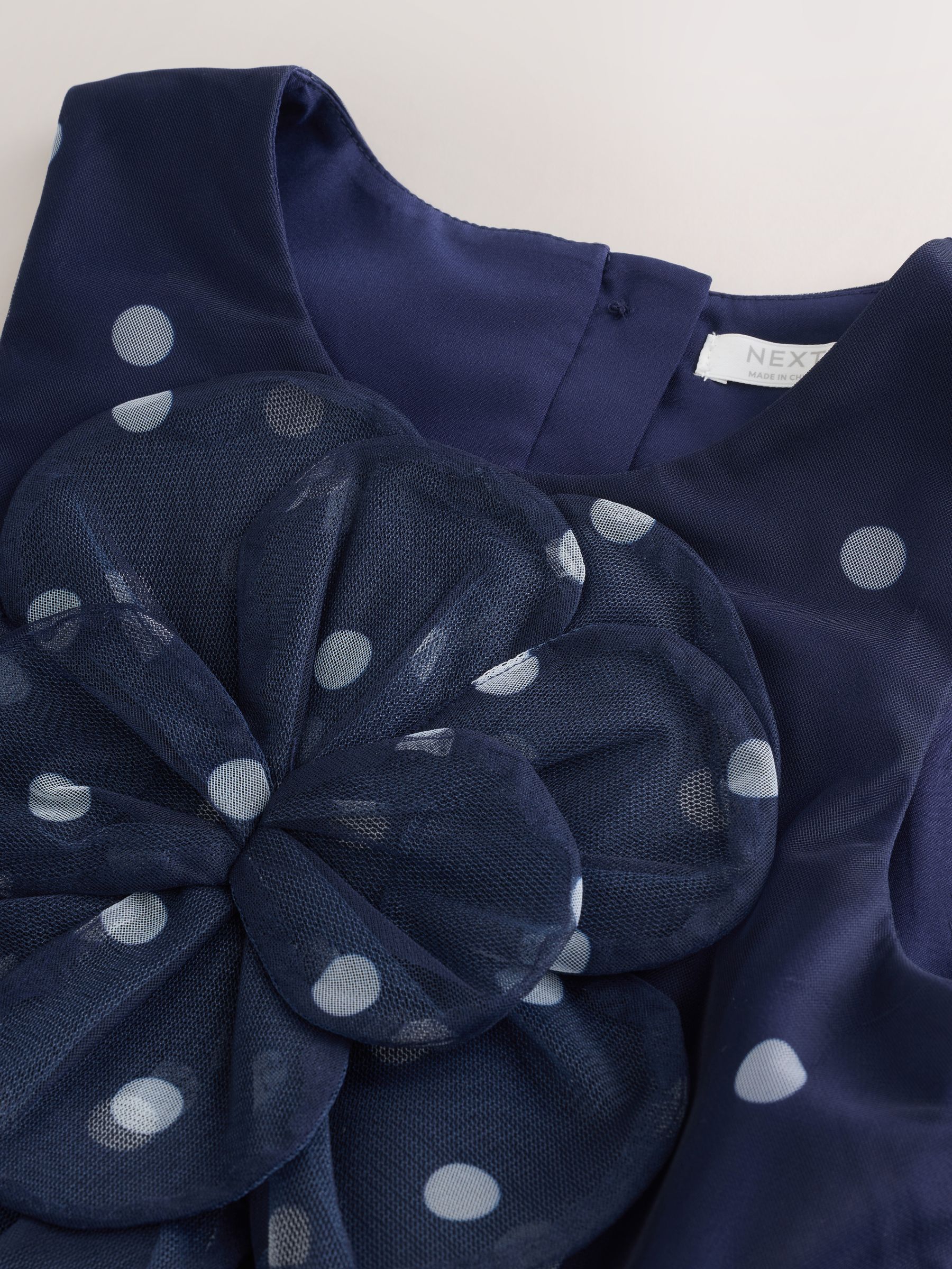 Buy Navy Spot Flower Corsage Mesh Occasion Dress (3-16yrs) from