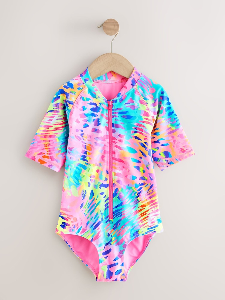 Rainbow Animal Tie Dye - Short Sleeved Sunsafe Swimsuit (3mths-16yrs) - صورة 1 من 4 Rainbow Animal Tie Dye - Short Sleeved Sunsafe Swimsuit (3mths-16yrs) - صورة 1 من 4