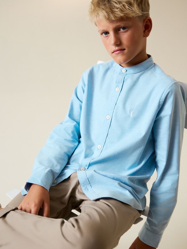 أزرق - Long Sleeve Grandad Collar Oxford Shirt (3-16yrs) - صورة 2 من 7 أزرق - Long Sleeve Grandad Collar Oxford Shirt (3-16yrs) - صورة 2 من 7