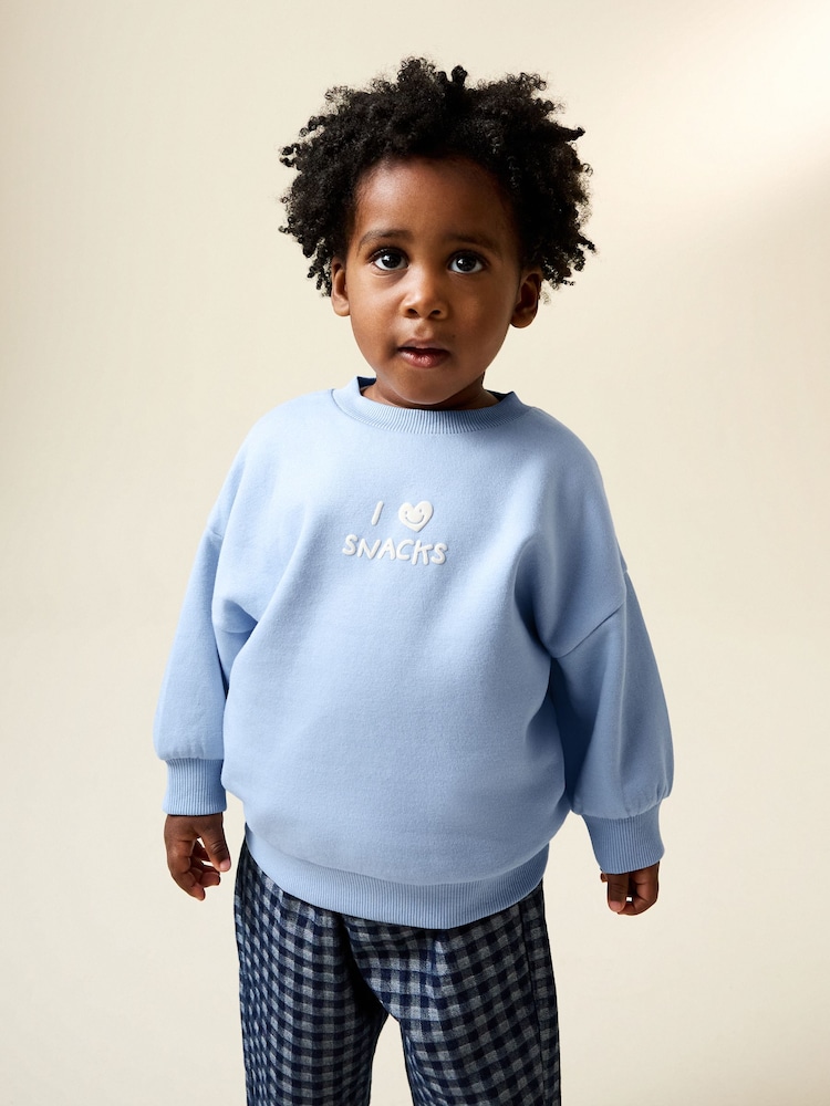 Blue I Love Snacks All-Over Print Crew Neck Sweatshirt (3mths-7yrs) - Image 1 of 8 Blue I Love Snacks All-Over Print Crew Neck Sweatshirt (3mths-7yrs) - Image 1 of 8