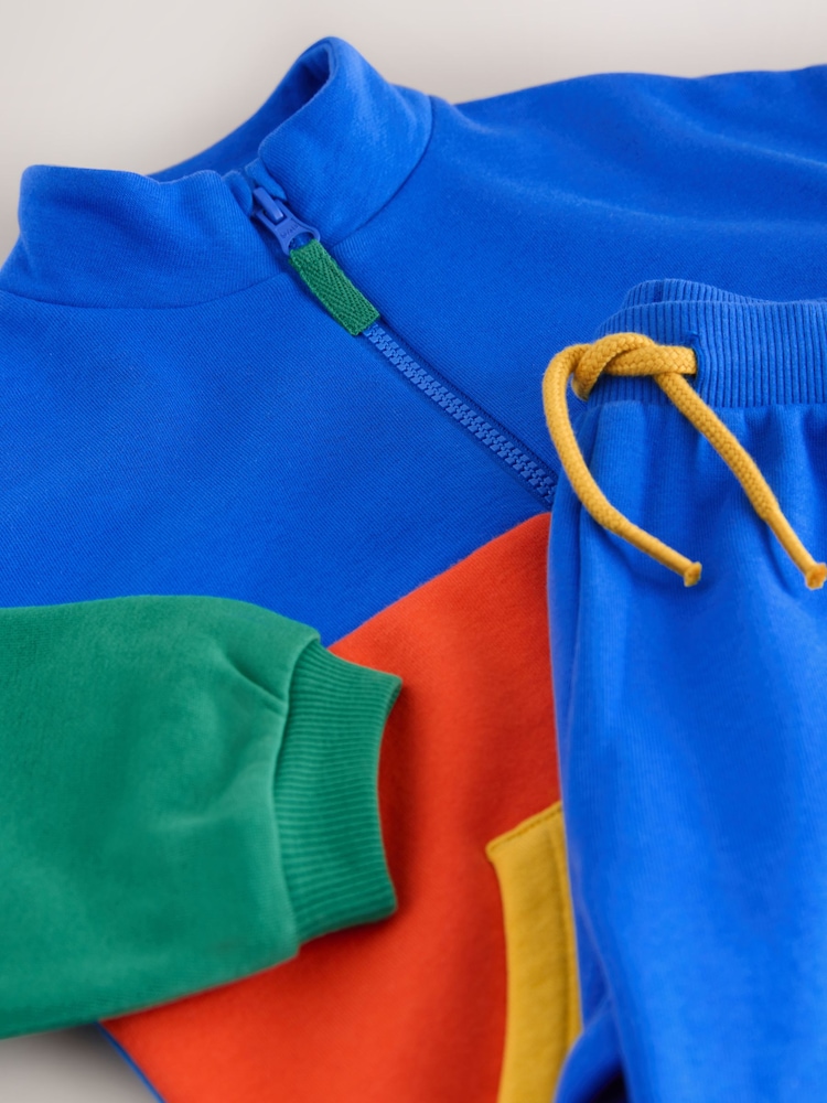 Green/Blue Colourblock - طقم سويت شيرت بسحاب وياقة قمعية وبنطلون رياضي (3شهور-7سنوات) - صورة 9 من 9 Green/Blue Colourblock - طقم سويت شيرت بسحاب وياقة قمعية وبنطلون رياضي (3شهور-7سنوات) - صورة 9 من 9