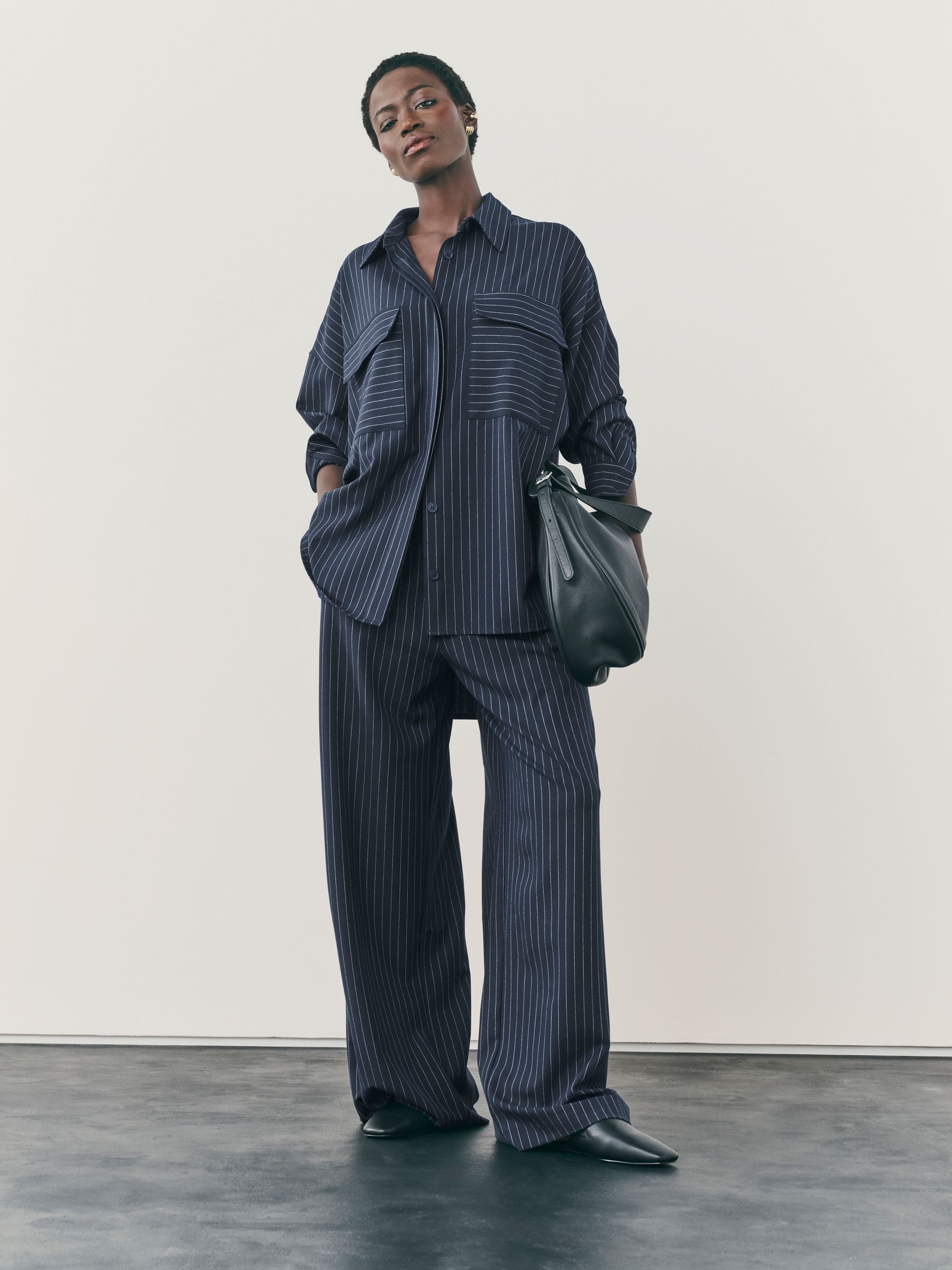 Buy Nothing Ordinary Navy Pinstripe Wide Leg Trousers from the